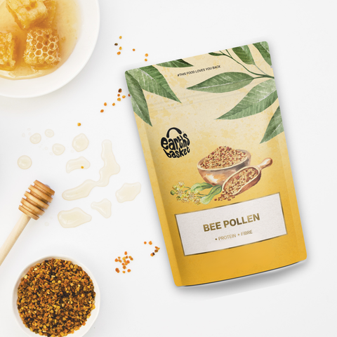 Bag of bee pollen with honey and honeycomb on a white background