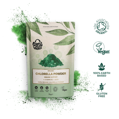 A package of Chlorella powder with text, logos and splash of green powder 