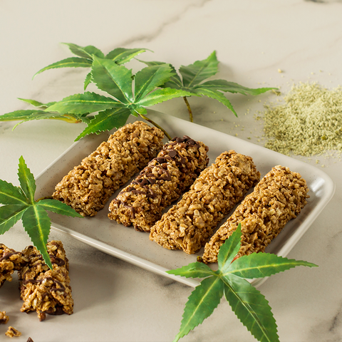 granolla bar in a casserole with hemp leaves