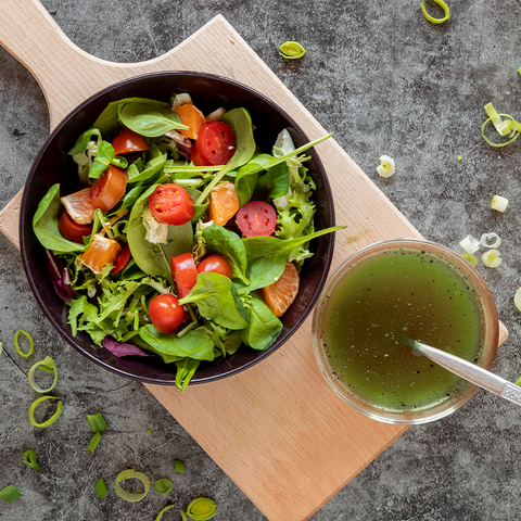 Salad bowl with green dressing