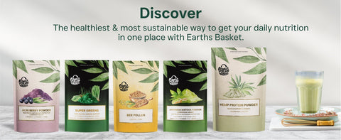 Earth's Basket health products with a glass of green juice on a white background