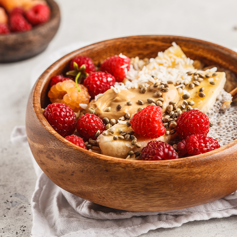 porridge bowl with raspberry toppings
