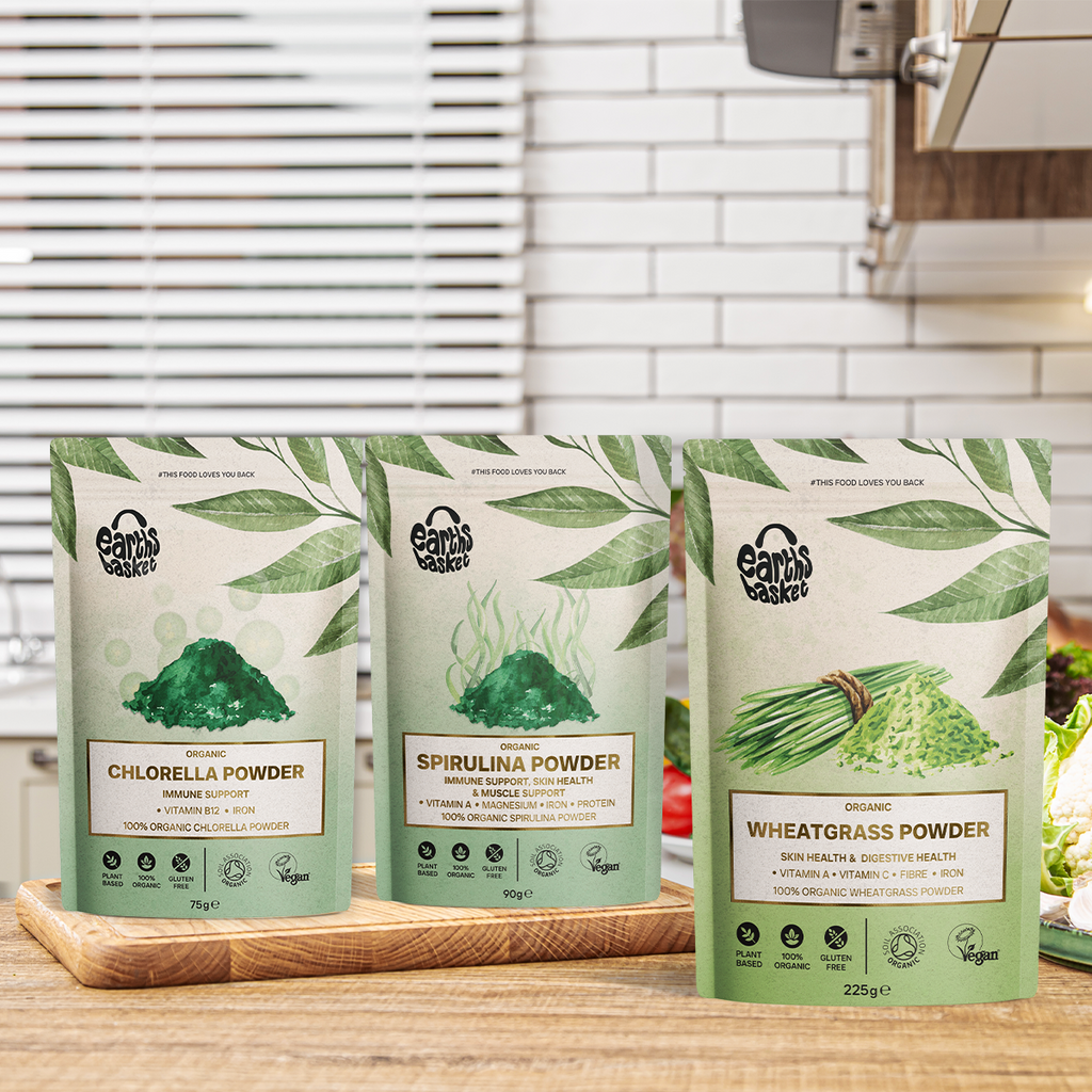 Package display of Spirulina Powder, Wheatgrass powder & Chlorella Powder in a kitchen
